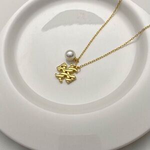 Tory Burch Gold Logo Pendant Necklace with White Pearl Accent